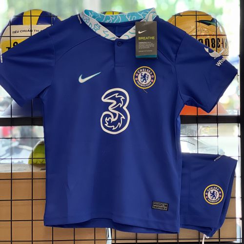 Quần áo trẻ em Chelsea màu xanh bích sân nhà 2022-23 hàng thái f1
